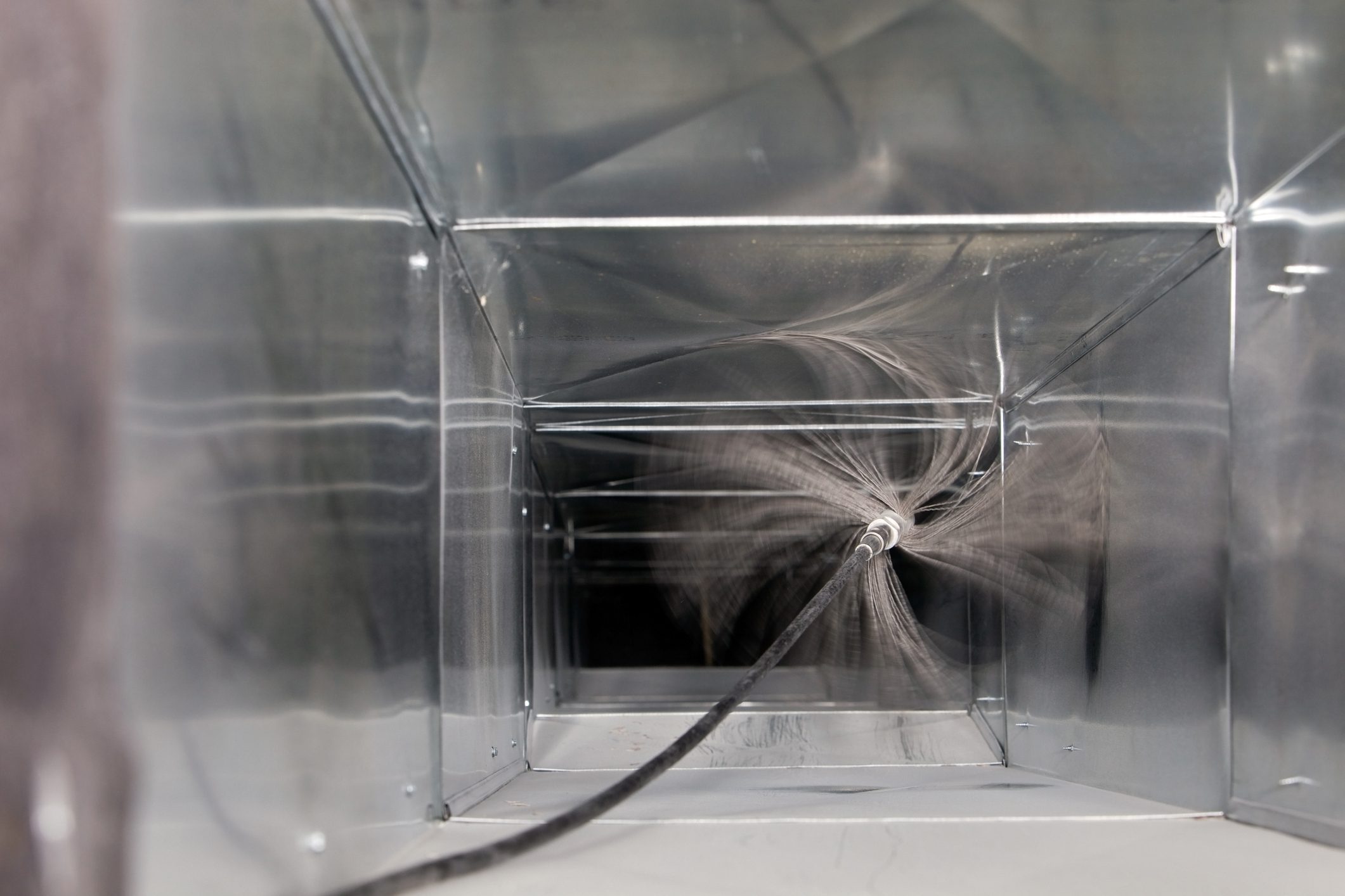 Air duct interior with cleaning brush